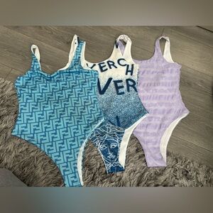 3 Designer one piece swim wear size small